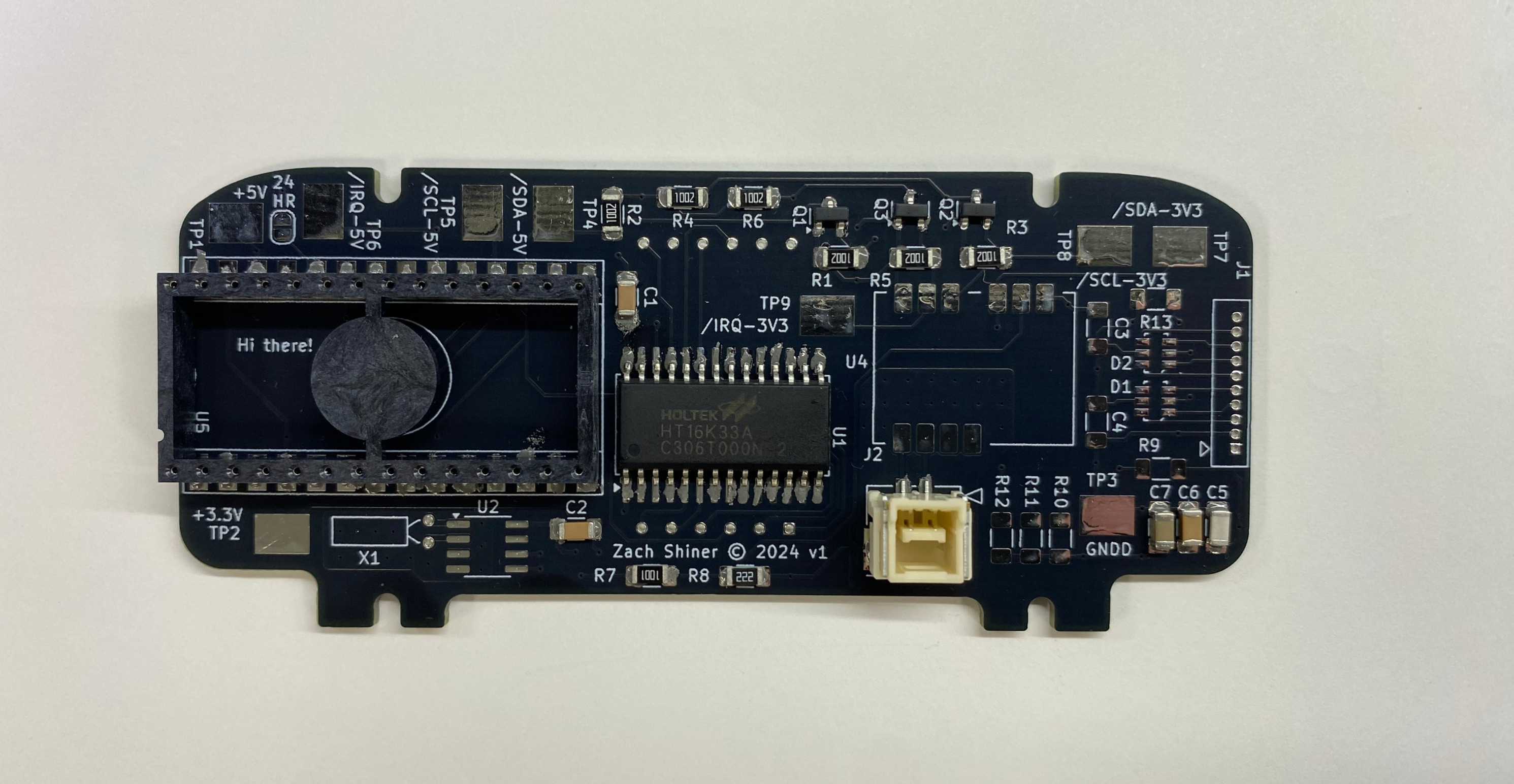 Assembled v1 PCB on the bench